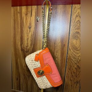 Coach Turnlock Wristlet Orange Leather and Straw Bag